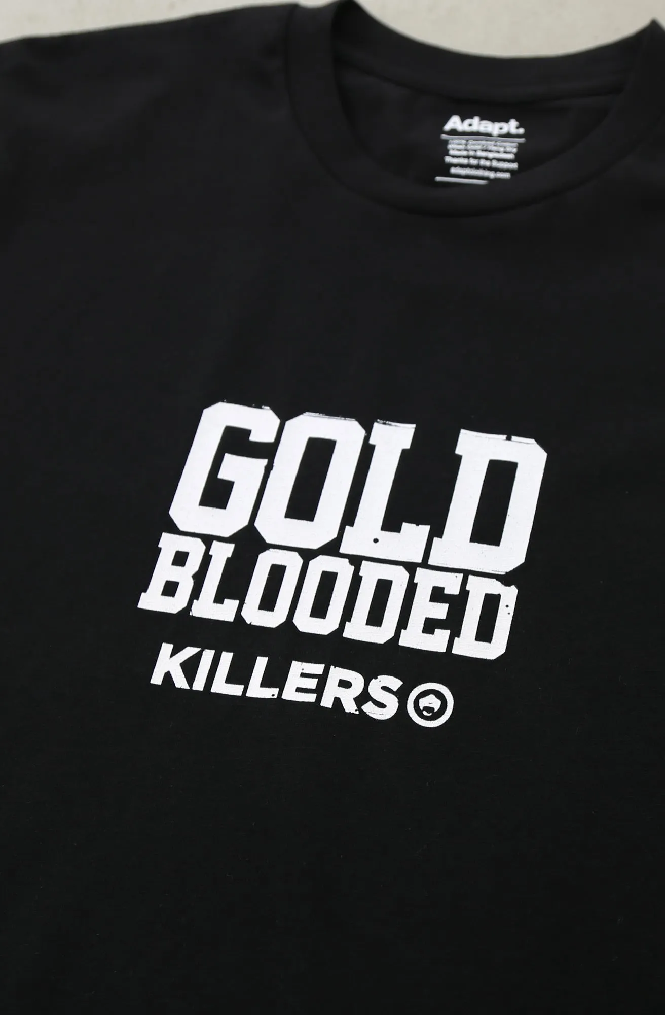 MIGHTYKILLERS X Adapt :: Gold Blooded Killers (Men's Black/White A1 Tee)