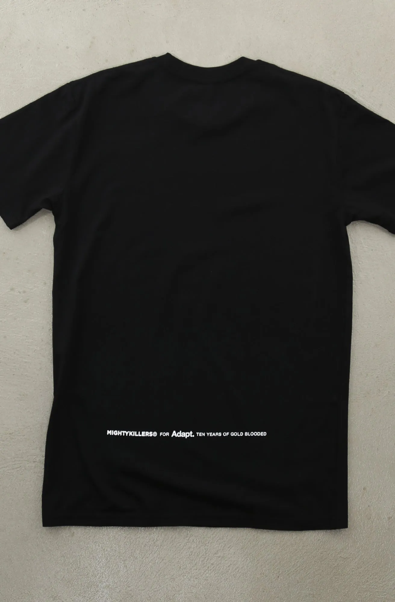 MIGHTYKILLERS X Adapt :: Gold Blooded Killers (Men's Black/White A1 Tee)